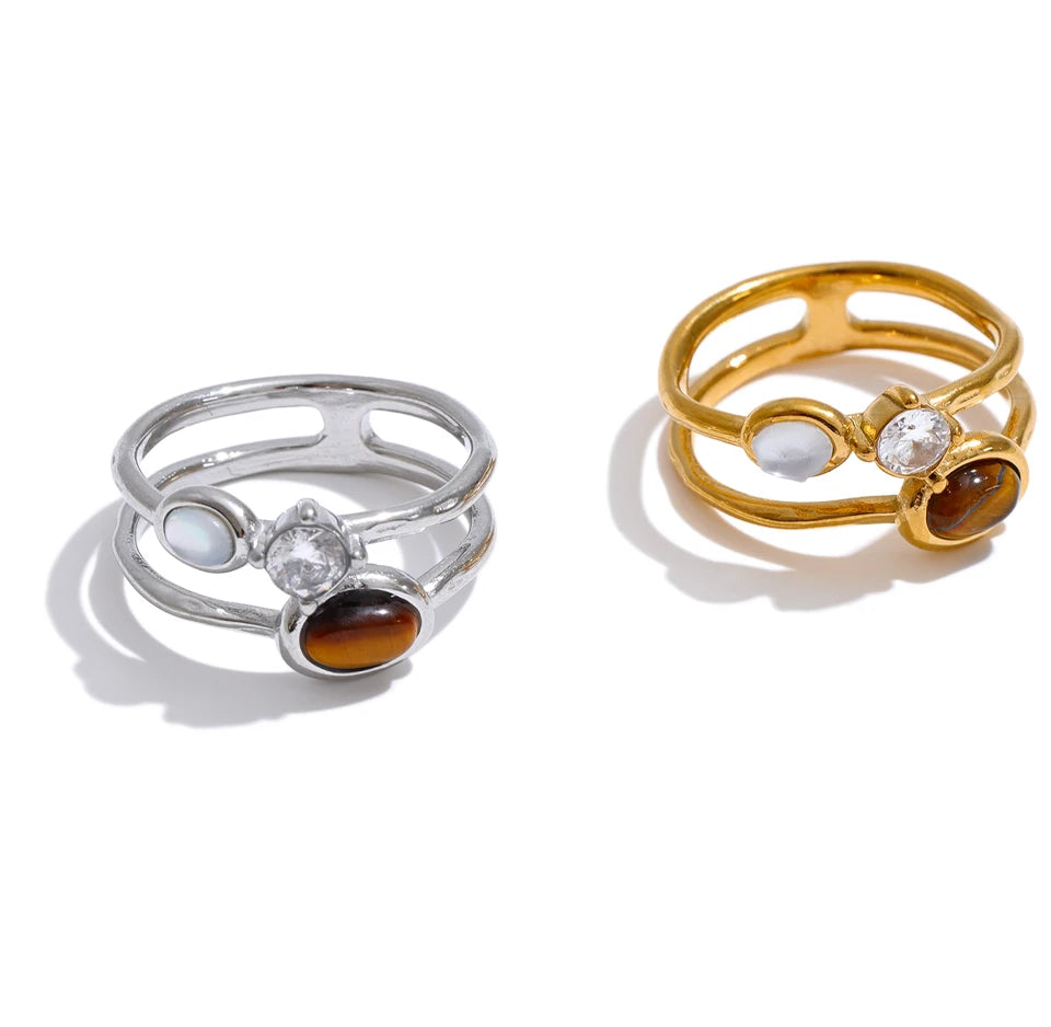 Cubic zirconia natural stone geometric ring in 18K gold-plated stainless steel with cubic zirconia and natural stone.