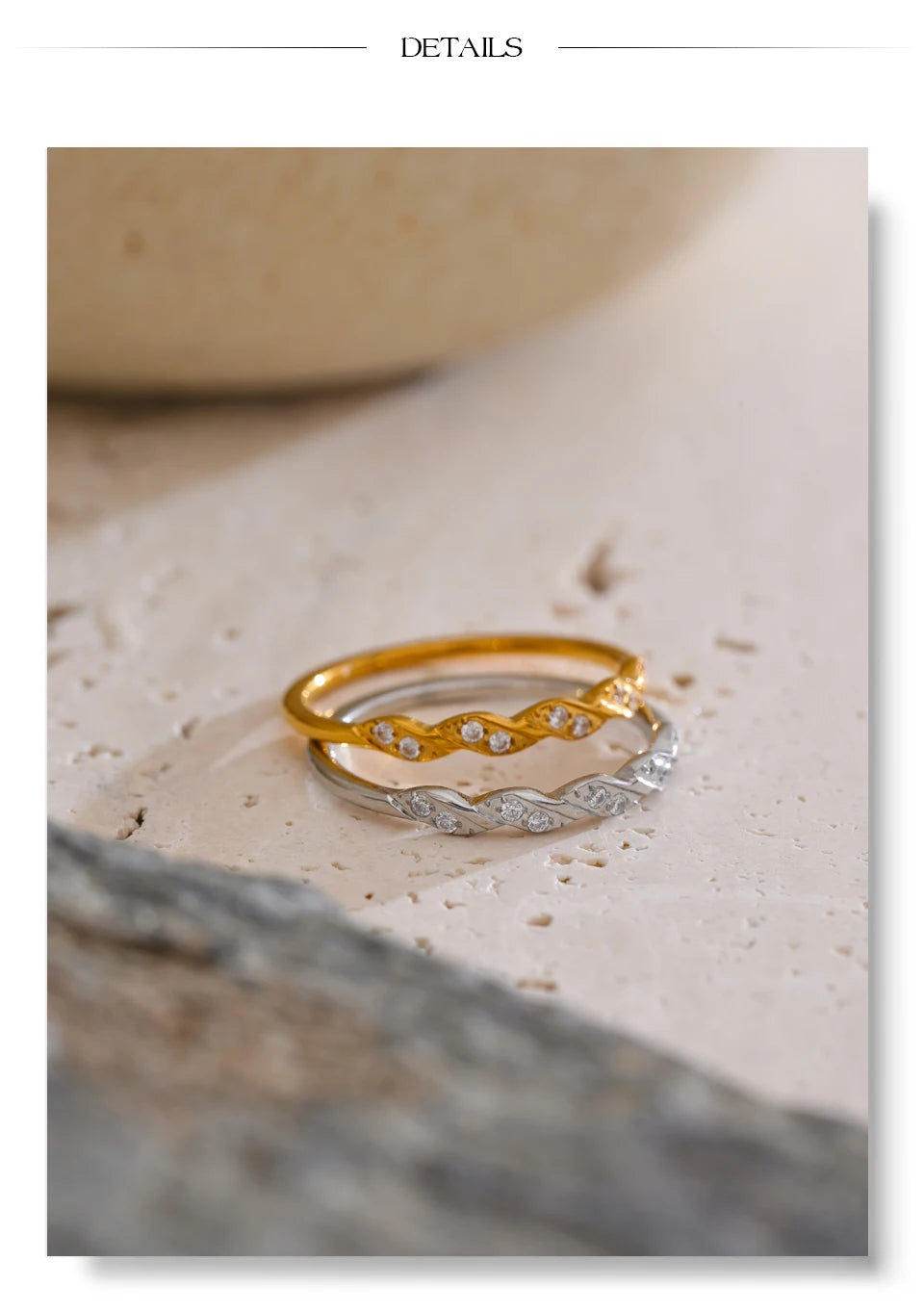 Cubic zirconia geometric ring in gold-plated stainless steel with cubic zirconia.
