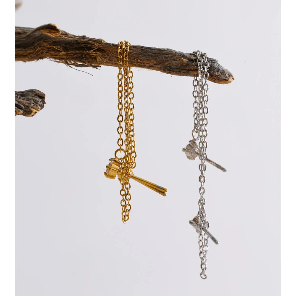 Cubic zirconia geometric chain earrings in gold-plated stainless steel with cubic zirconia.