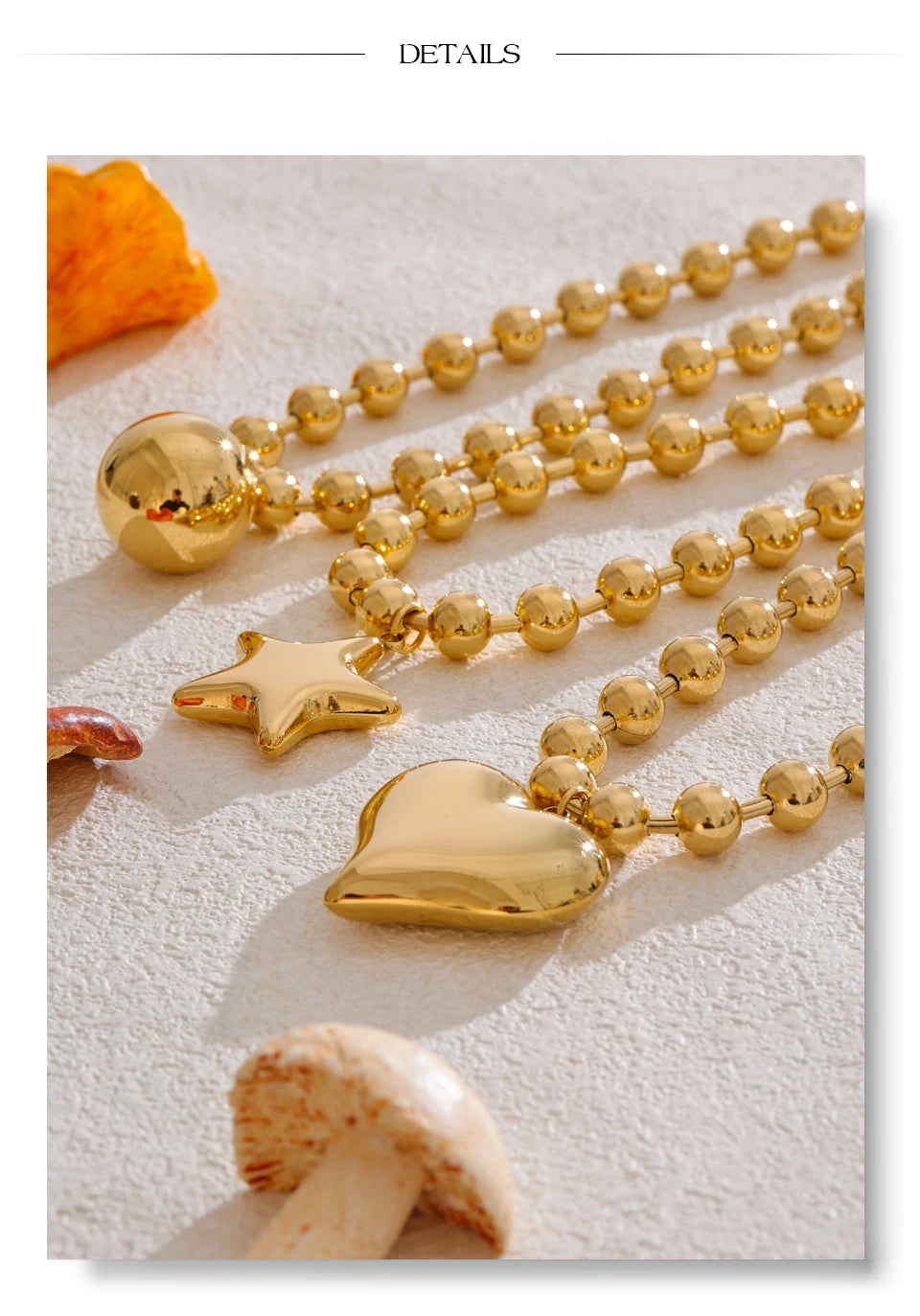 Heart star beaded necklace in gold-plated stainless steel.