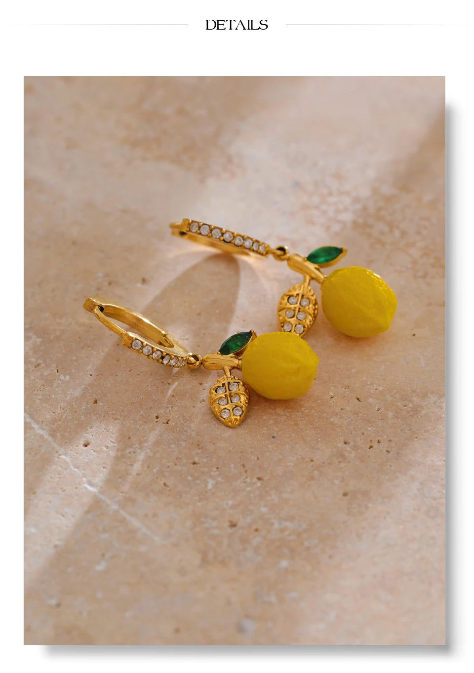 Cubic zirconia resin geometric earrings in gold-plated stainless steel with cubic zirconia and resin.