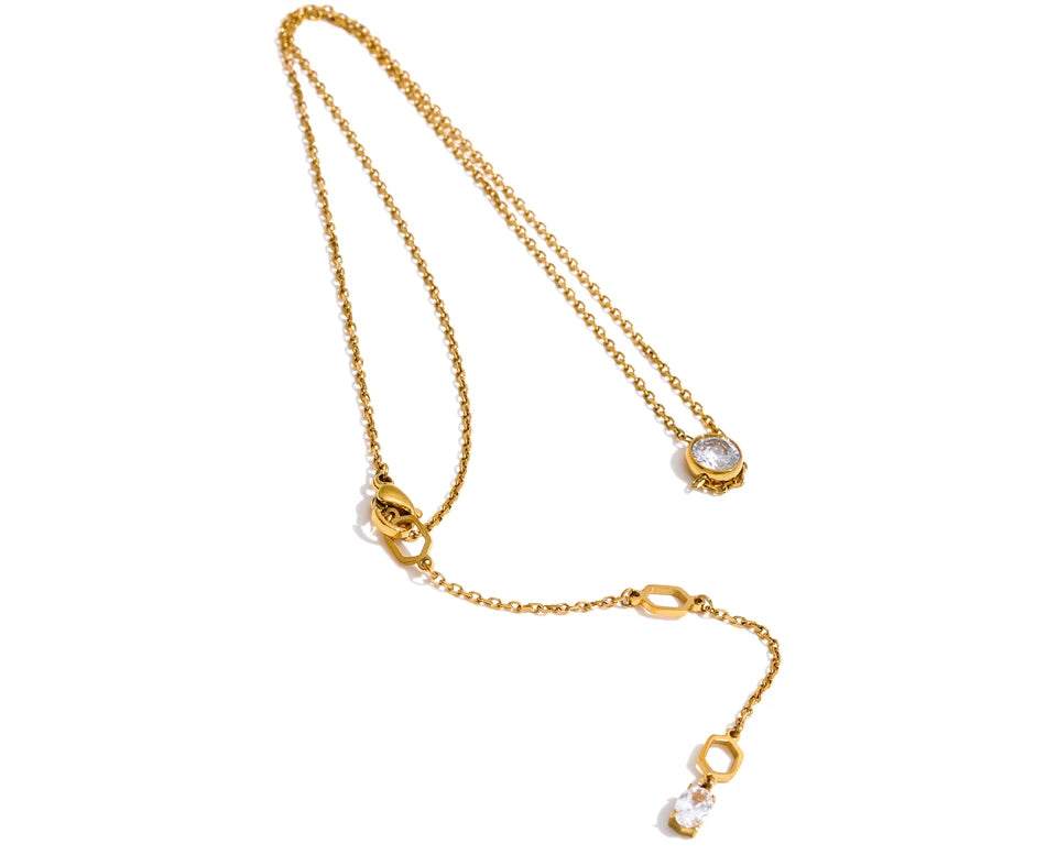 Cubic zirconia geometric necklace in gold-plated stainless steel with cubic zirconia.