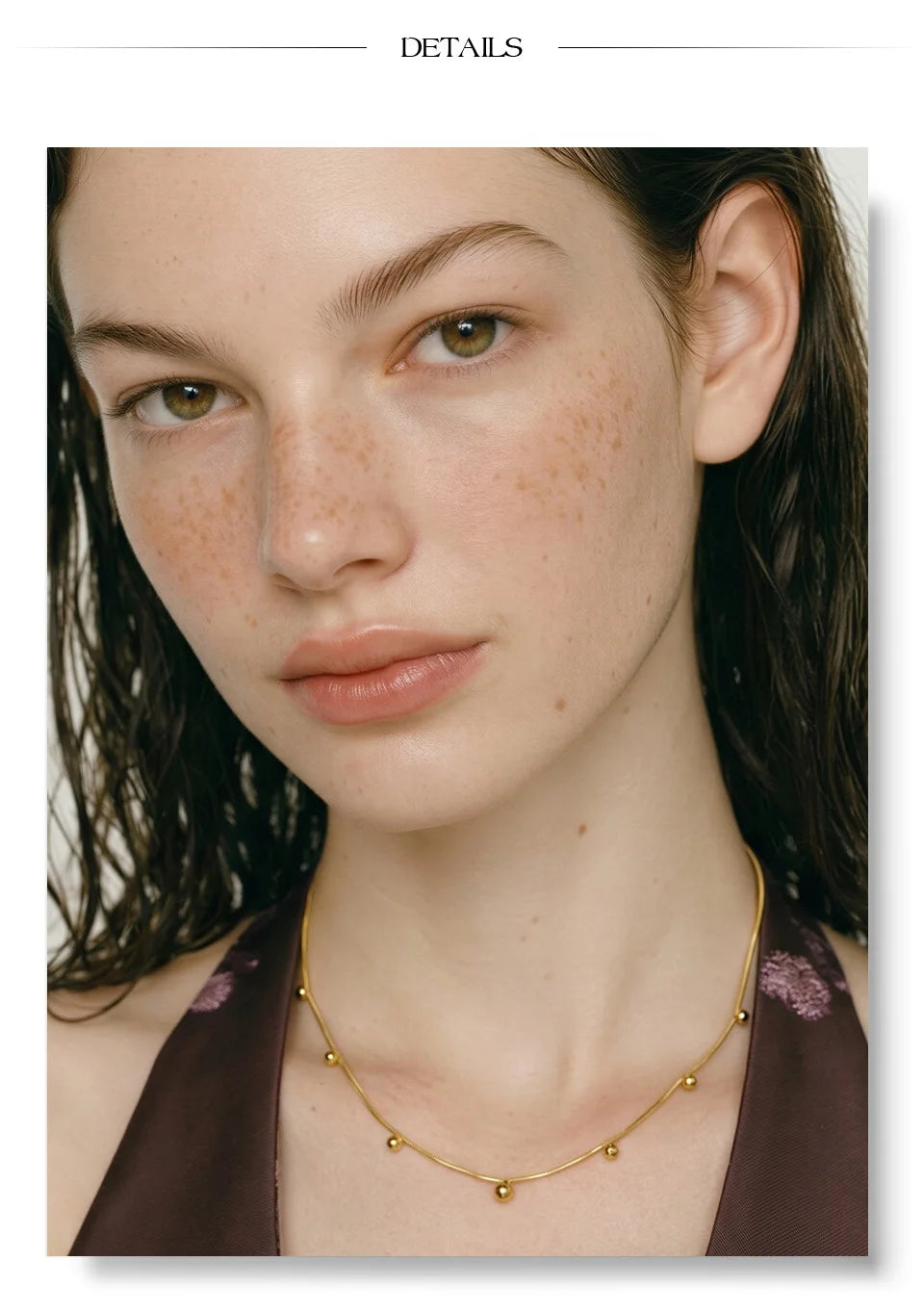 Beaded geometric chain necklace in gold-plated stainless steel.