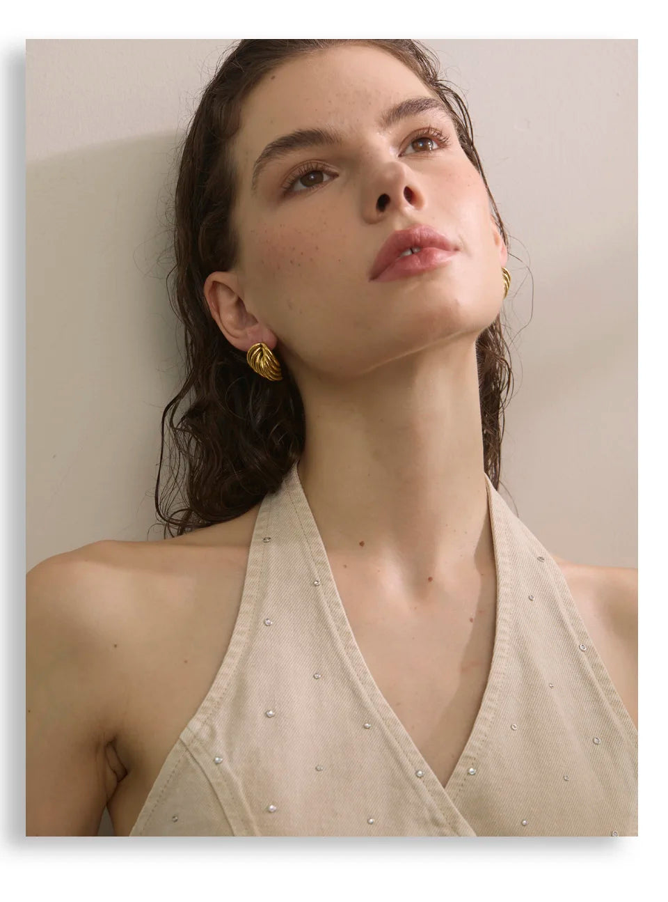Geometric earrings in gold-plated stainless steel.