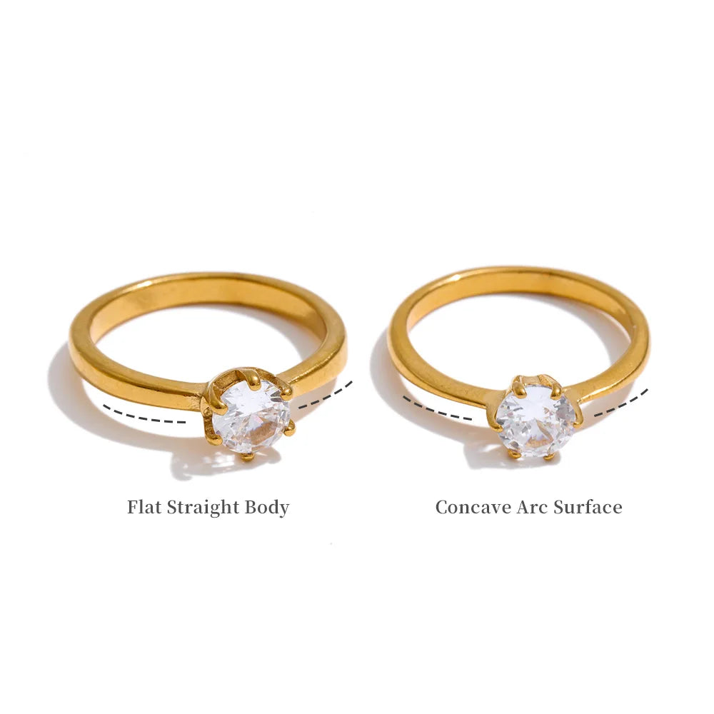 Cubic zirconia geometric ring in 18K gold-plated stainless steel with cubic zirconia.