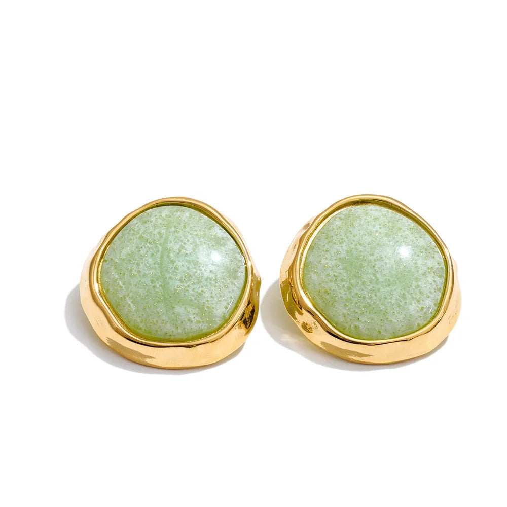 White resin acrylic earrings in gold-plated stainless steel with resin and acrylic.