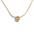 Cubic zirconia geometric necklace in gold-plated stainless steel with cubic zirconia.
