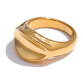 Geometric ring in gold-plated stainless steel.