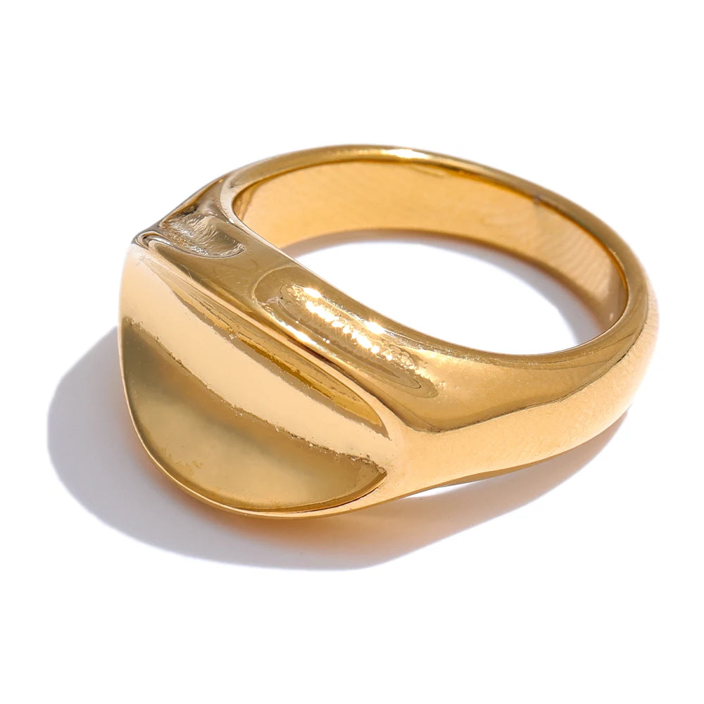 Geometric ring in gold-plated stainless steel.