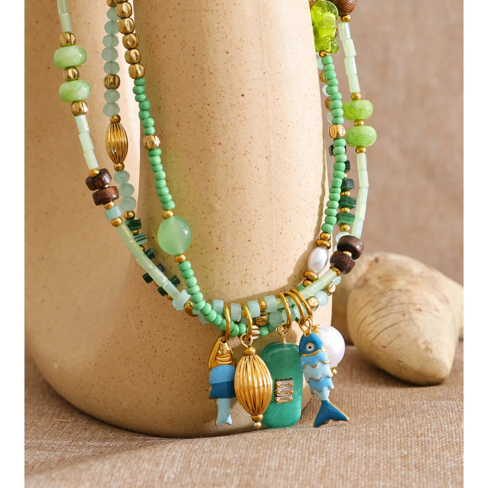 Pearl crystal geometric necklace in gold-plated stainless steel with pearl and crystal.