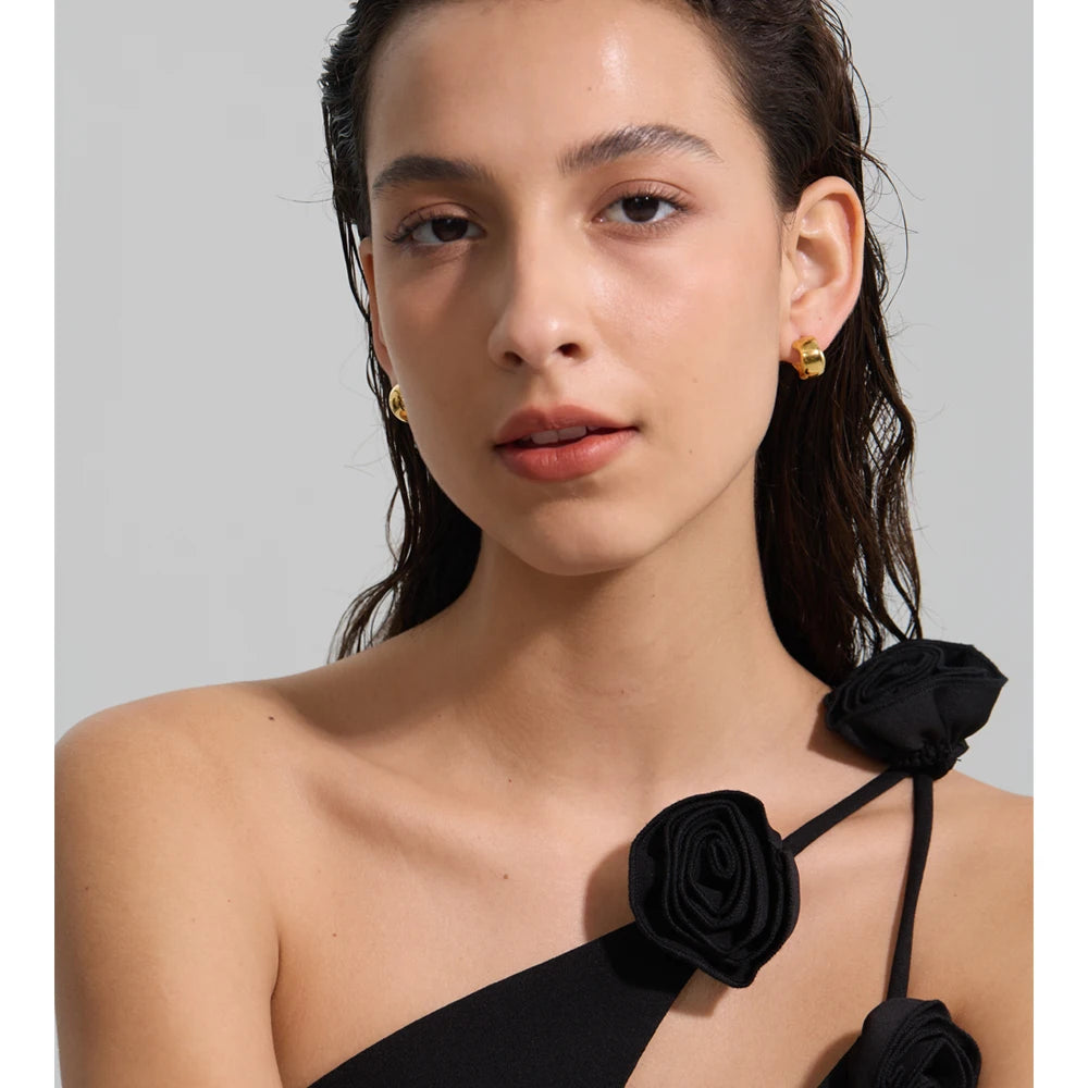 Geometric earrings in gold-plated stainless steel.