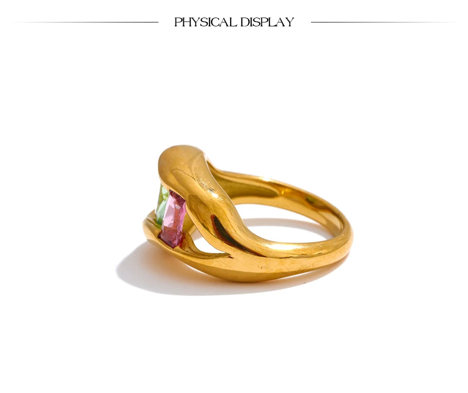 Cubic zirconia geometric ring in 18K gold-plated stainless steel with cubic zirconia.
