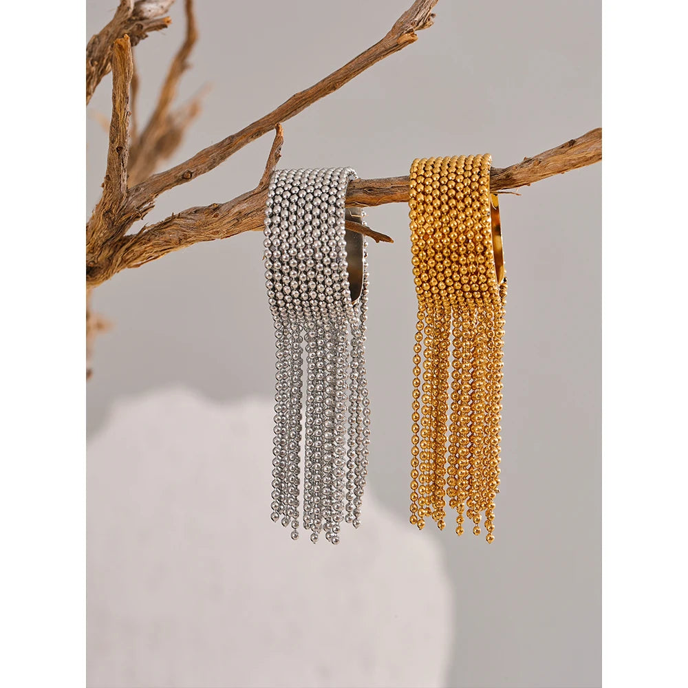Geometric chain ring in 18K gold-plated stainless steel.