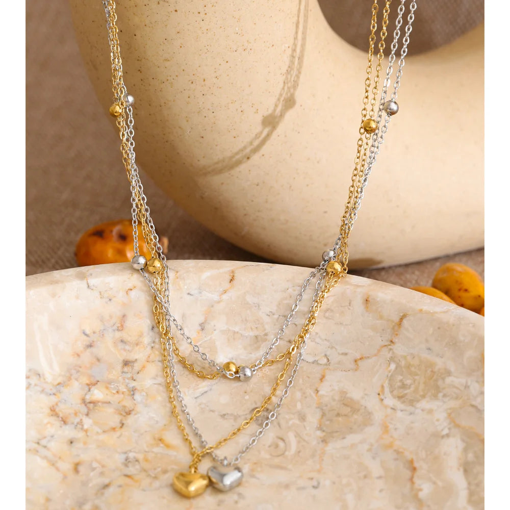 Heart chain necklace in gold-plated stainless steel.