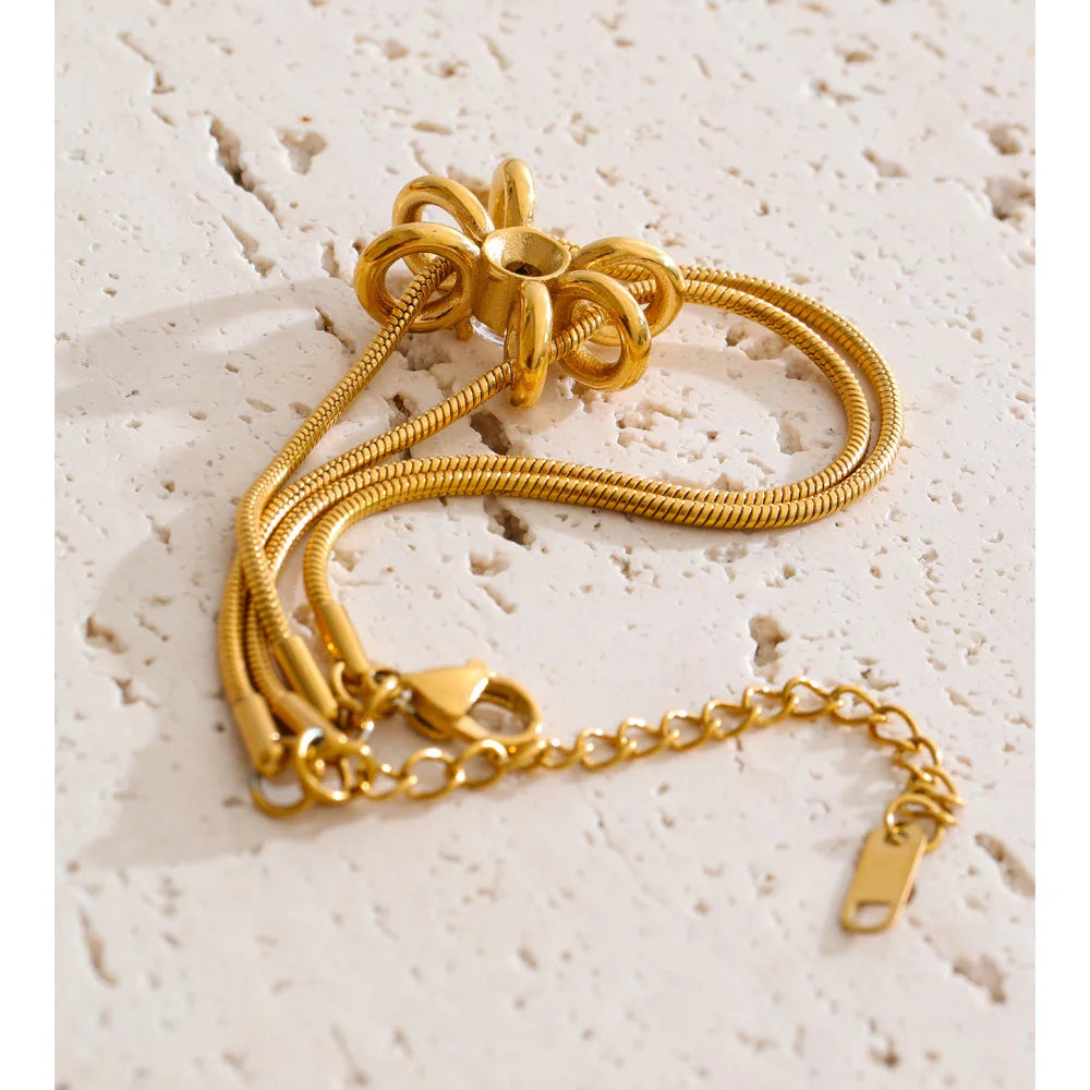 Cubic Zirconia Flower Geometric Bracelet — Gold-Plated Stainless Steel with Cubic Zirconia · PS1406