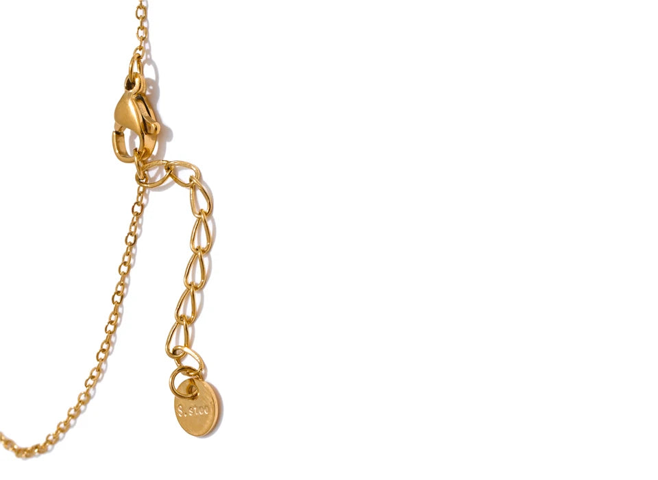 Cubic zirconia geometric chain necklace in gold-plated stainless steel with cubic zirconia.