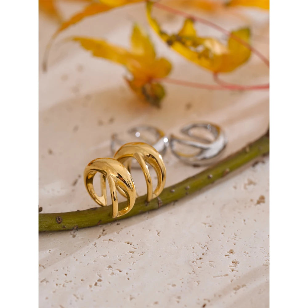 Geometric earrings in gold-plated 316L stainless steel.