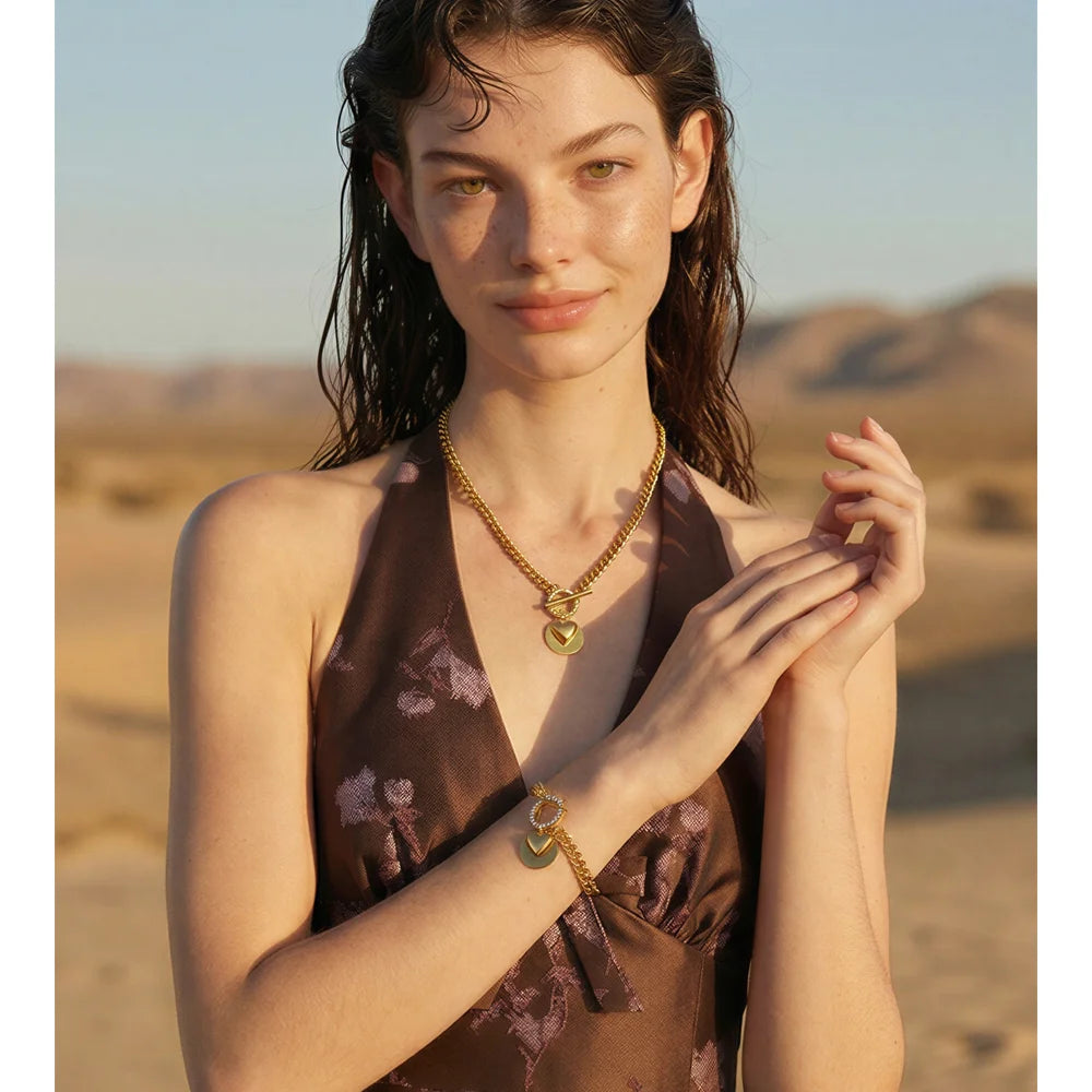 Geometric chain necklace in gold-plated stainless steel.