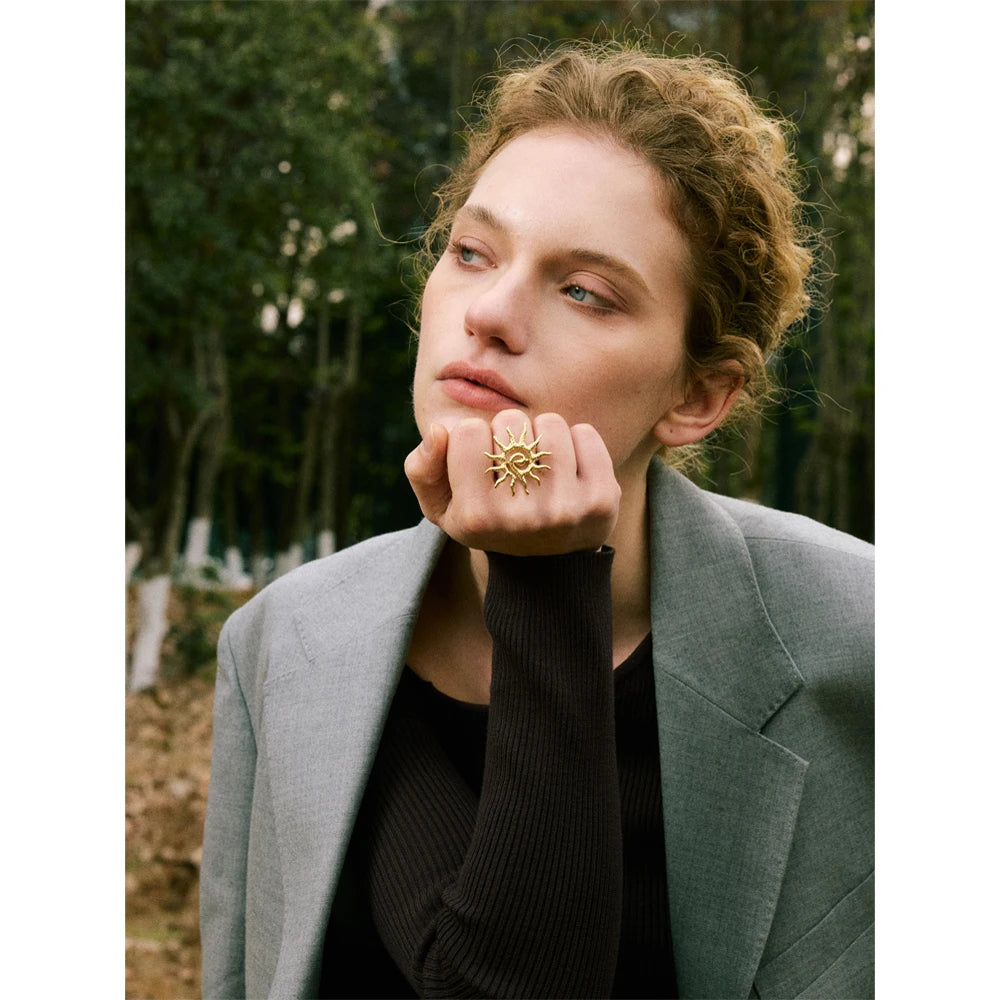 Sun geometric ring in 18K gold-plated stainless steel.