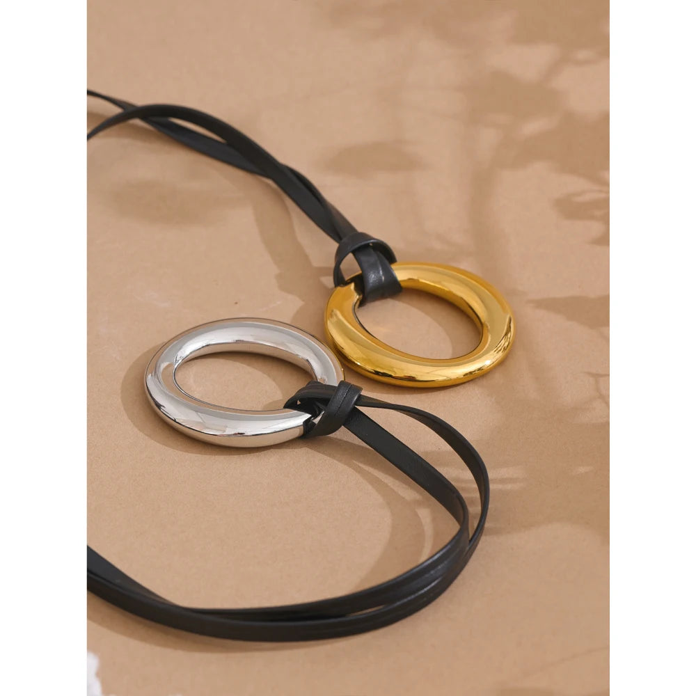 Coin geometric necklace in gold-plated stainless steel.