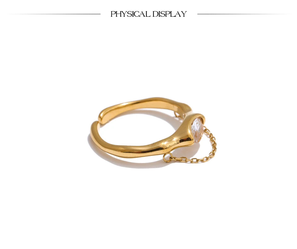 Cubic zirconia geometric chain ring in 18K gold-plated stainless steel with cubic zirconia.