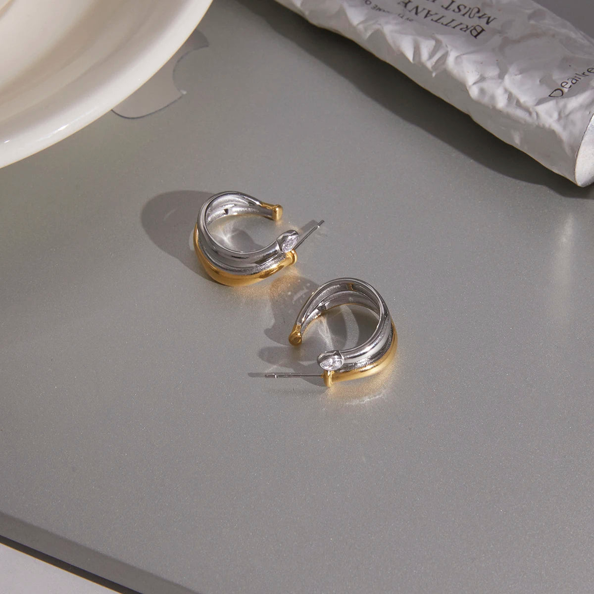 Two-Tone Twist Hoop Earrings — 18K Gold Plated · PA016