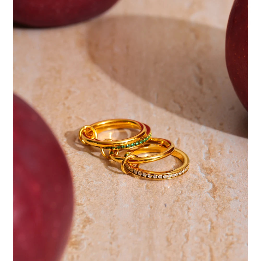 White cubic zirconia geometric ring in 18K gold-plated stainless steel with cubic zirconia.