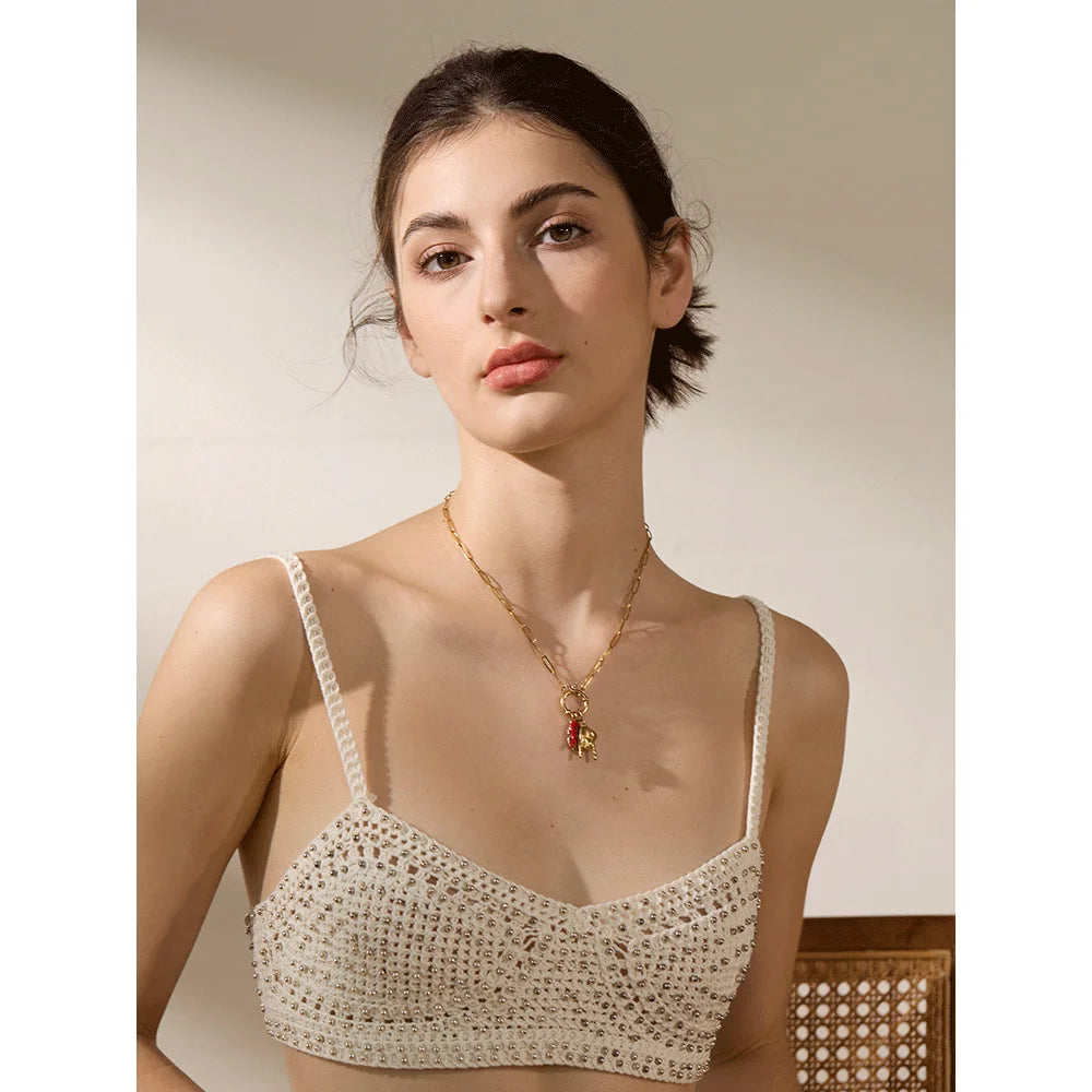 Red heart geometric necklace in gold-plated 316L stainless steel.
