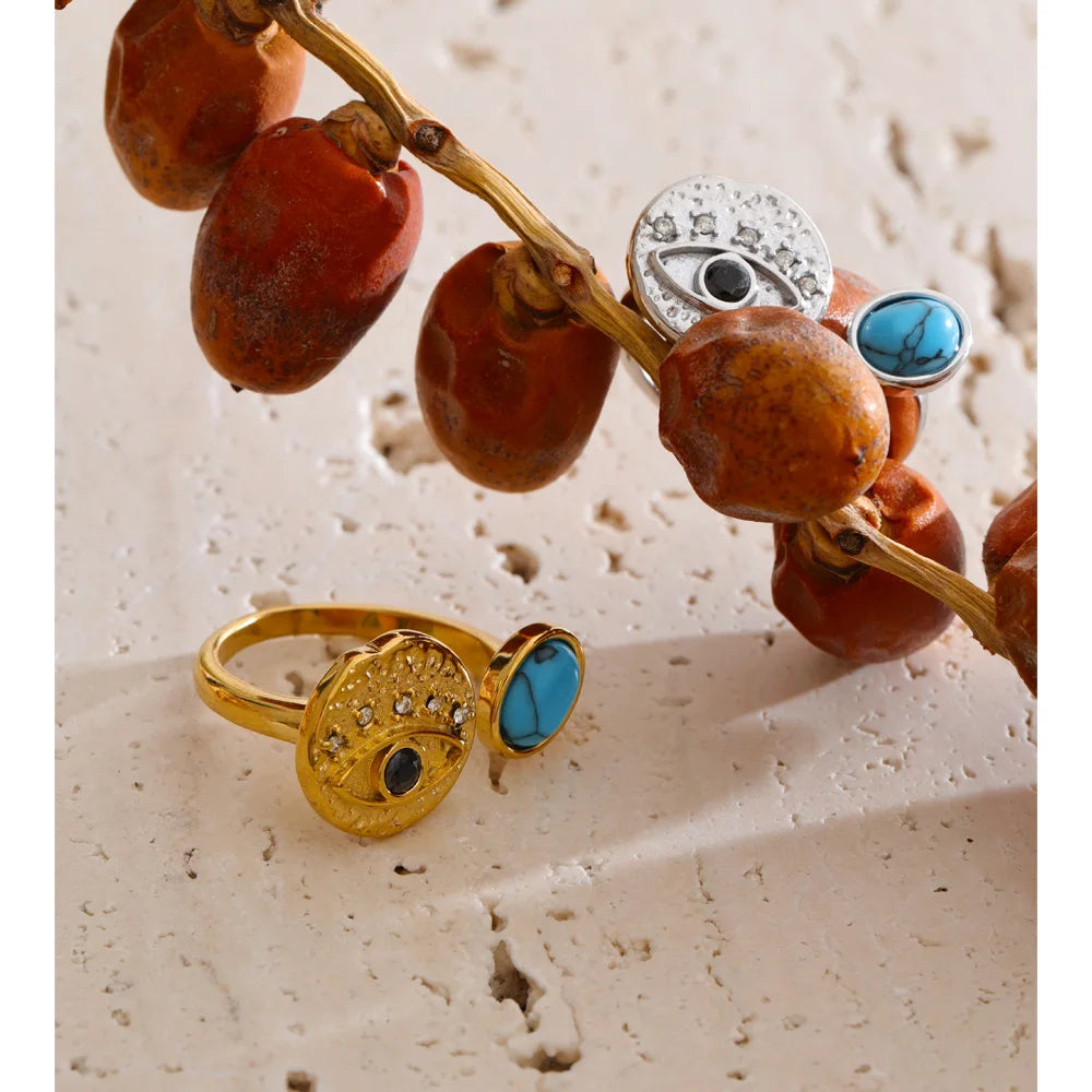 Cubic zirconia natural stone geometric ring in 18K gold-plated stainless steel with cubic zirconia and natural stone.