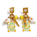 Enamel flower geometric earrings in gold-plated stainless steel with enamel.