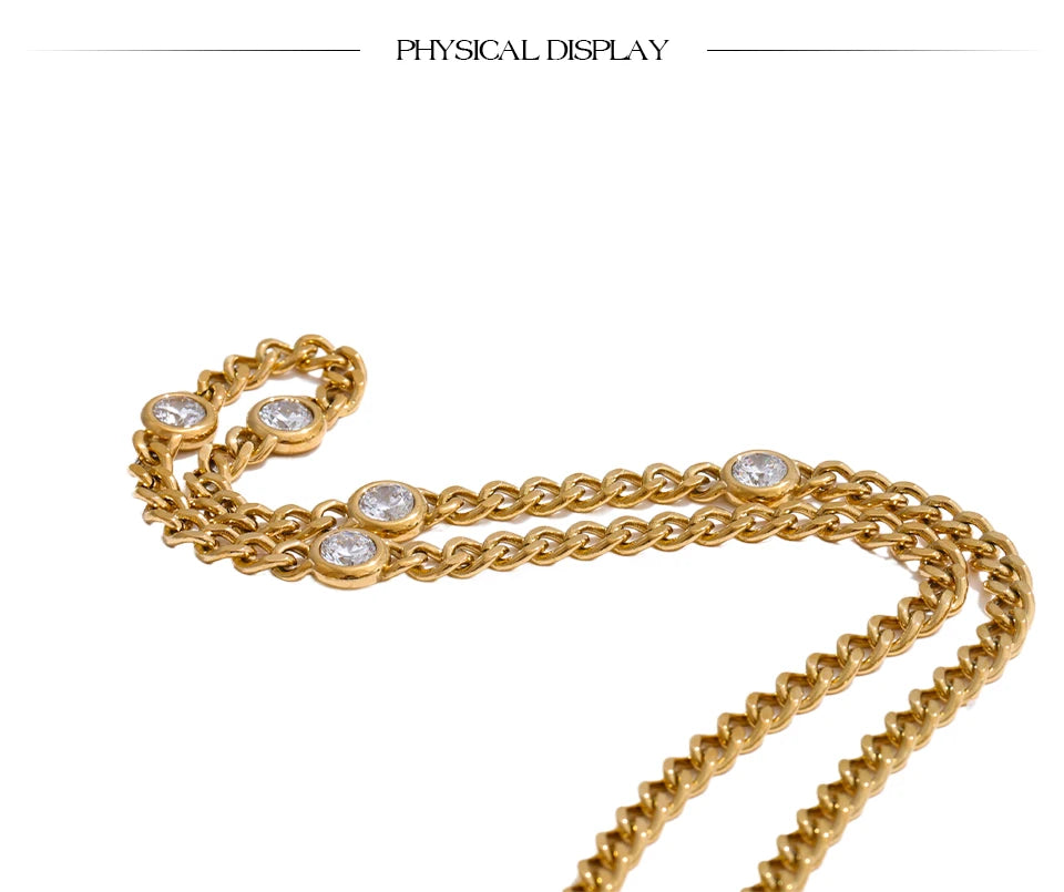 Cubic zirconia geometric chain necklace in gold-plated stainless steel with cubic zirconia.