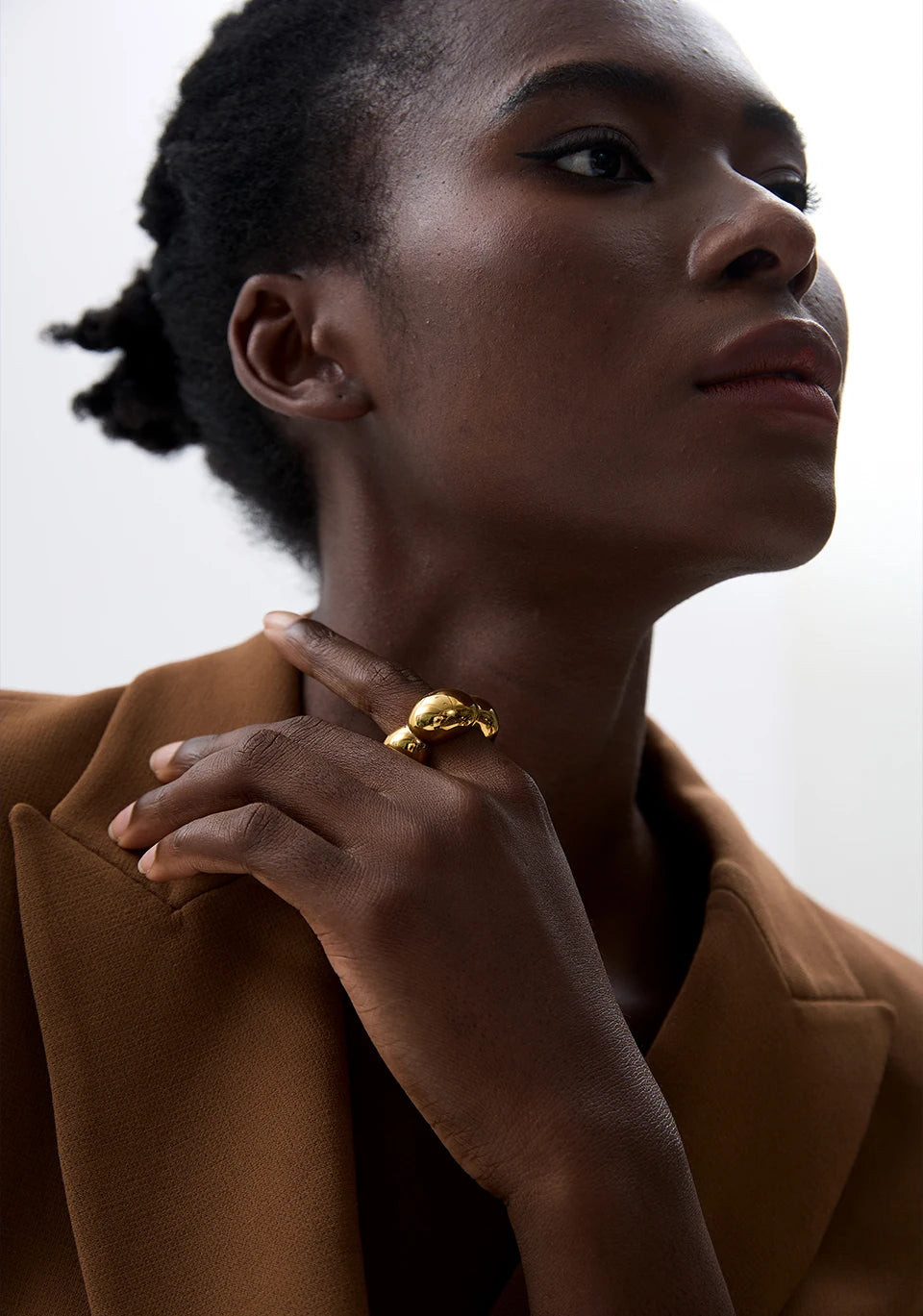 Flower geometric ring in 18K gold-plated 316L stainless steel.