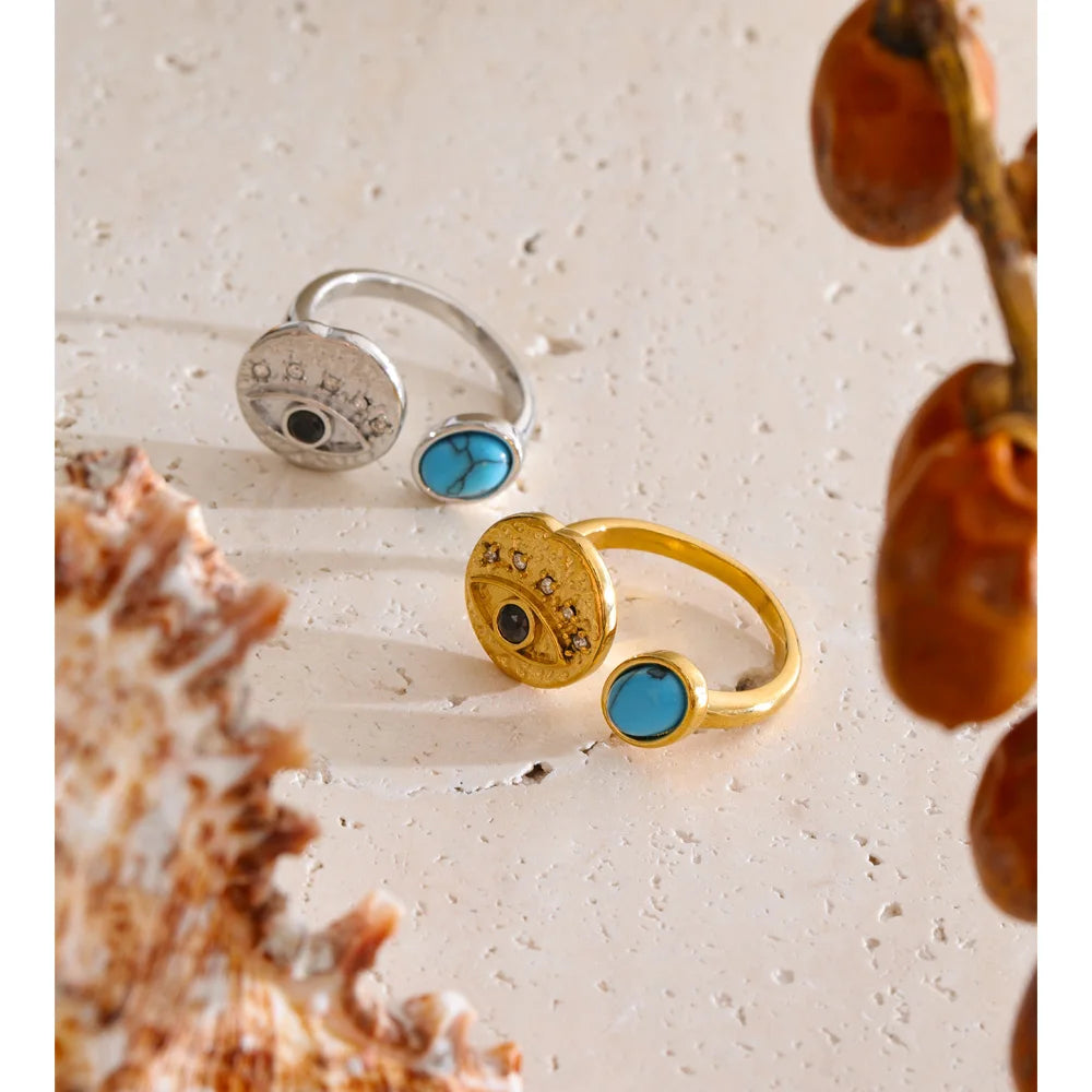 Cubic zirconia natural stone geometric ring in 18K gold-plated stainless steel with cubic zirconia and natural stone.