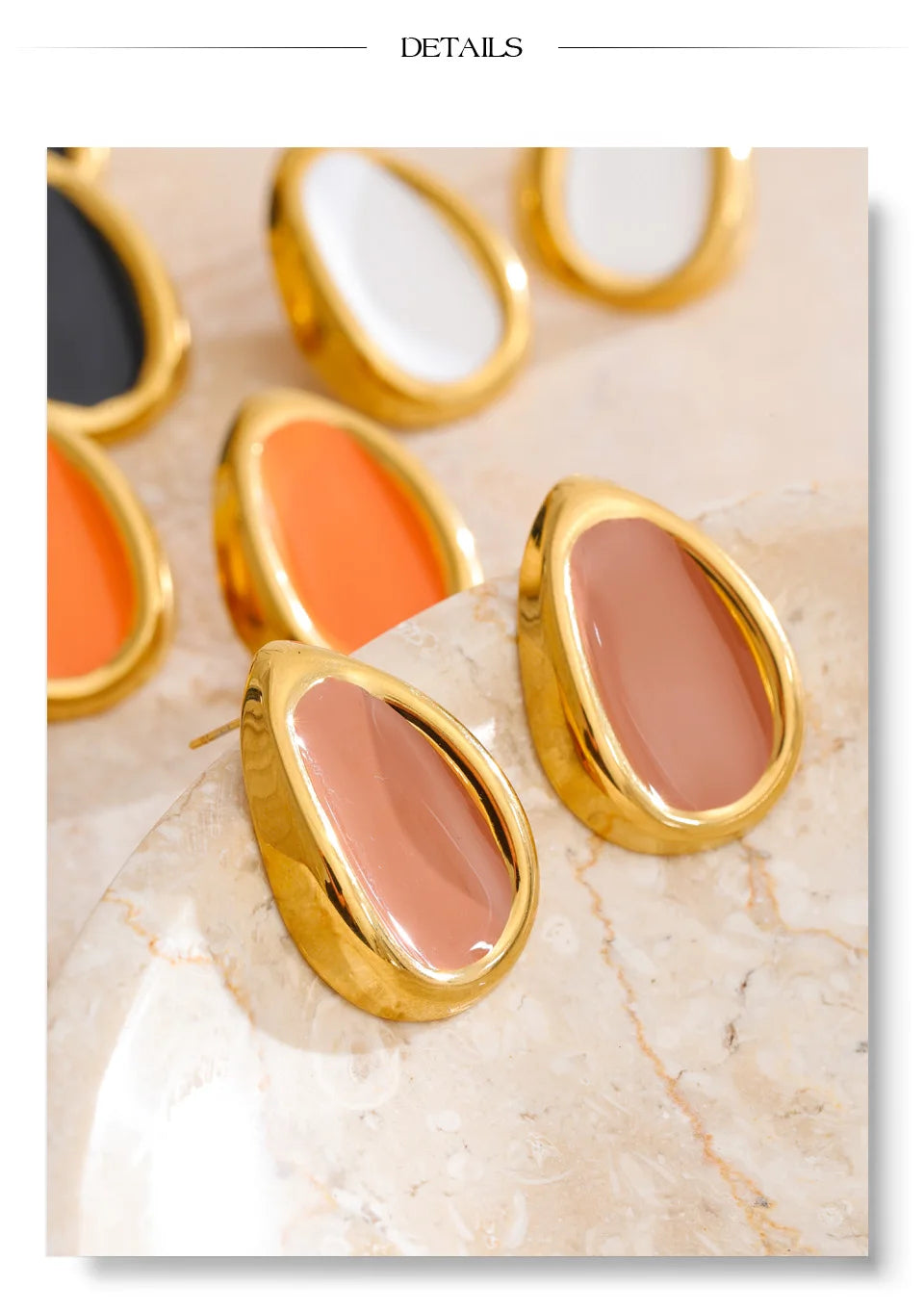 Enamel multi-color geometric earrings in gold-plated stainless steel with enamel.