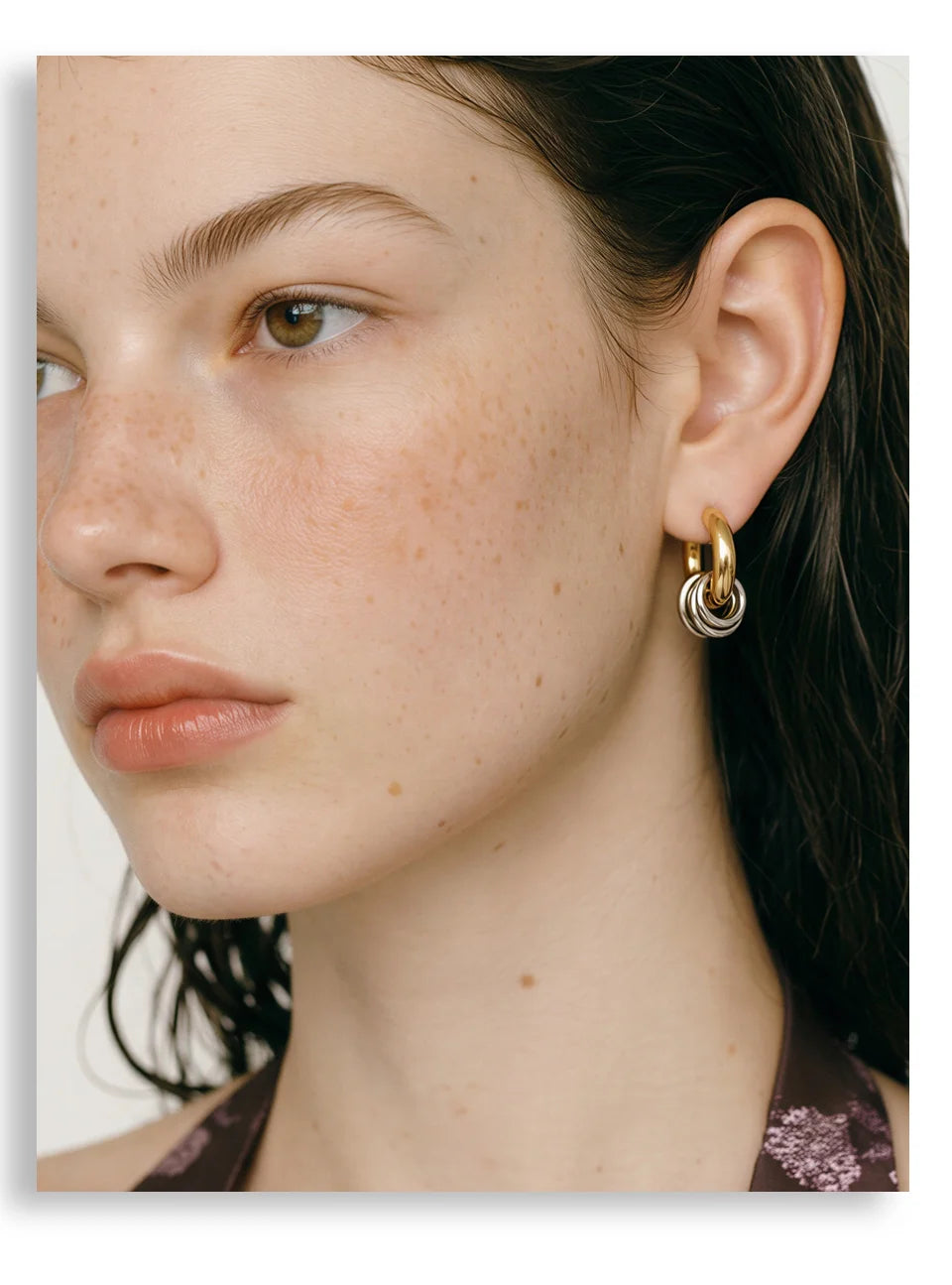 Geometric layered earrings in gold-plated stainless steel.