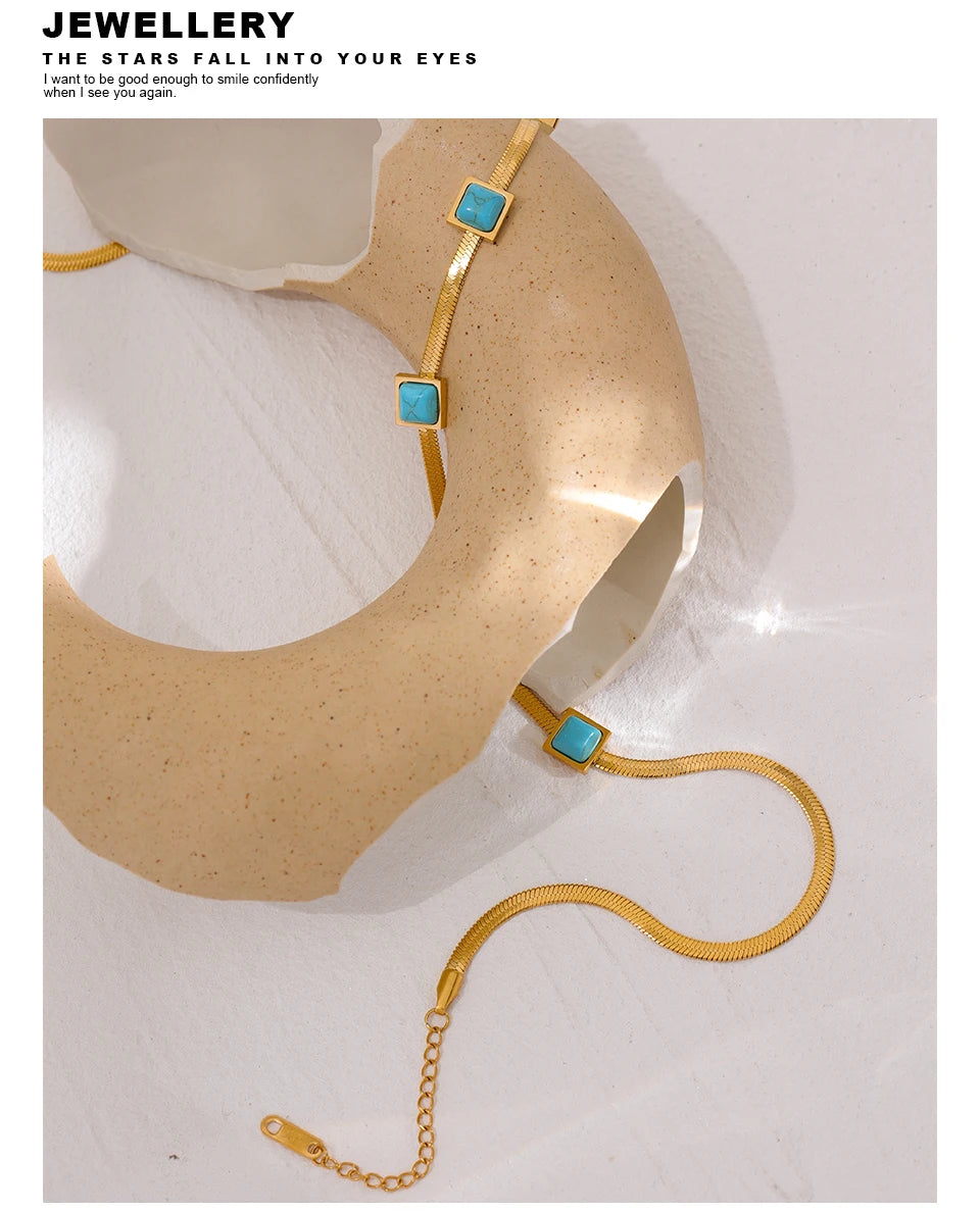 Blue natural stone snake necklace in gold-plated stainless steel with natural stone.