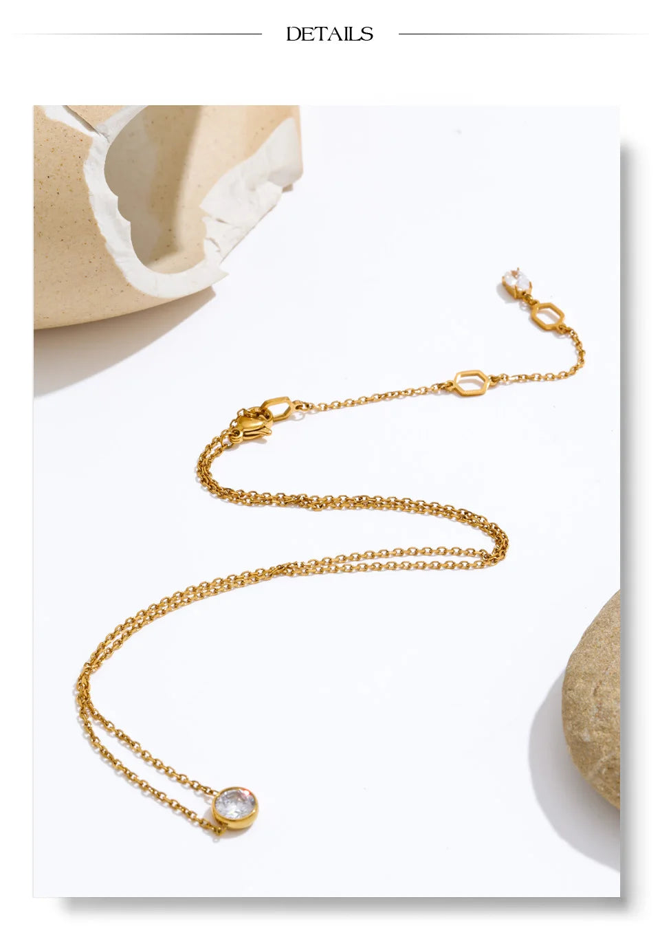 Cubic zirconia geometric necklace in gold-plated stainless steel with cubic zirconia.