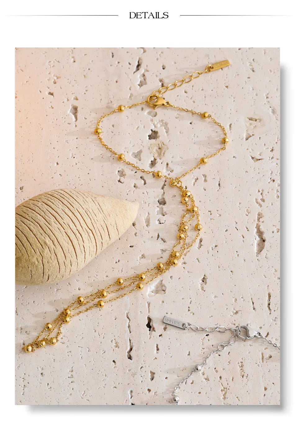 Beaded geometric chain necklace in gold-plated stainless steel.