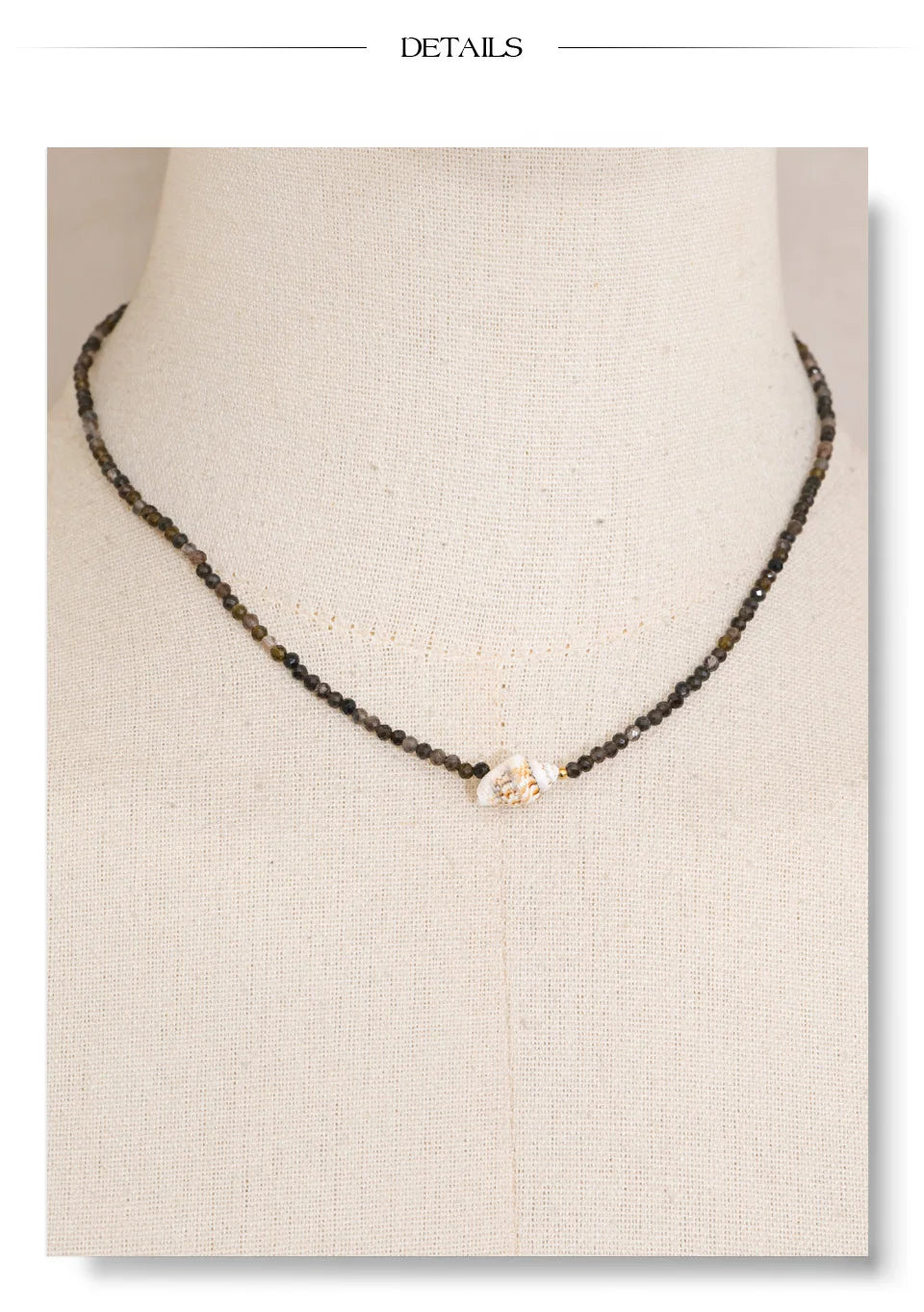Crystal geometric necklace in gold-plated stainless steel with crystal.