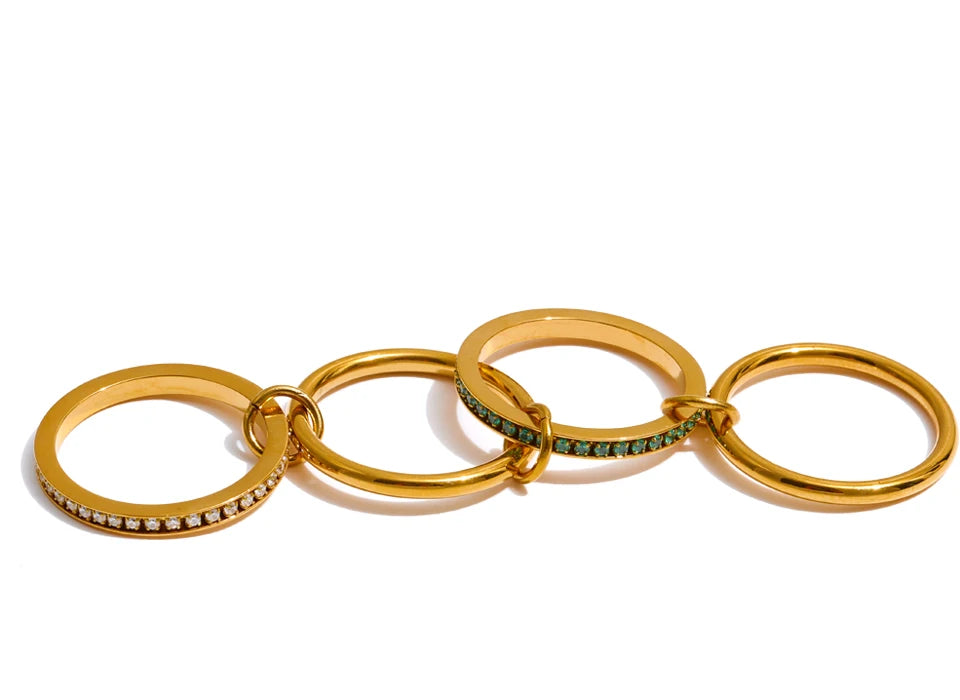 White cubic zirconia geometric ring in 18K gold-plated stainless steel with cubic zirconia.