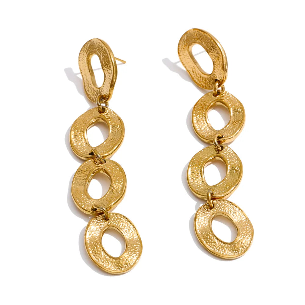 Geometric earrings in gold-plated stainless steel.