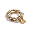 Beaded geometric bracelet in gold-plated stainless steel.