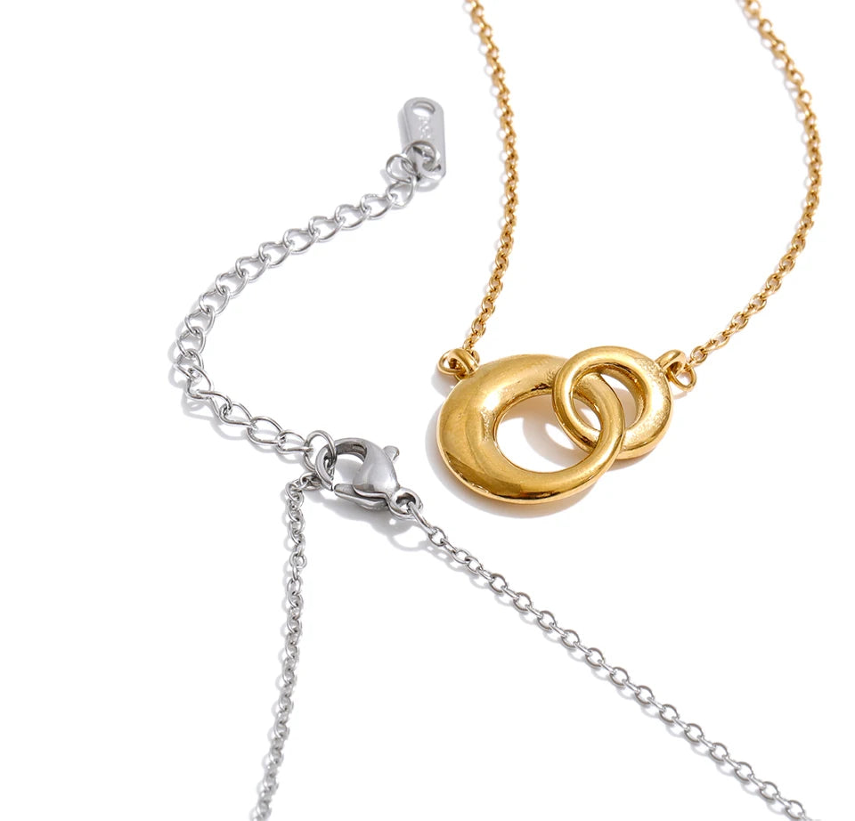 Coin geometric necklace in gold-plated stainless steel.