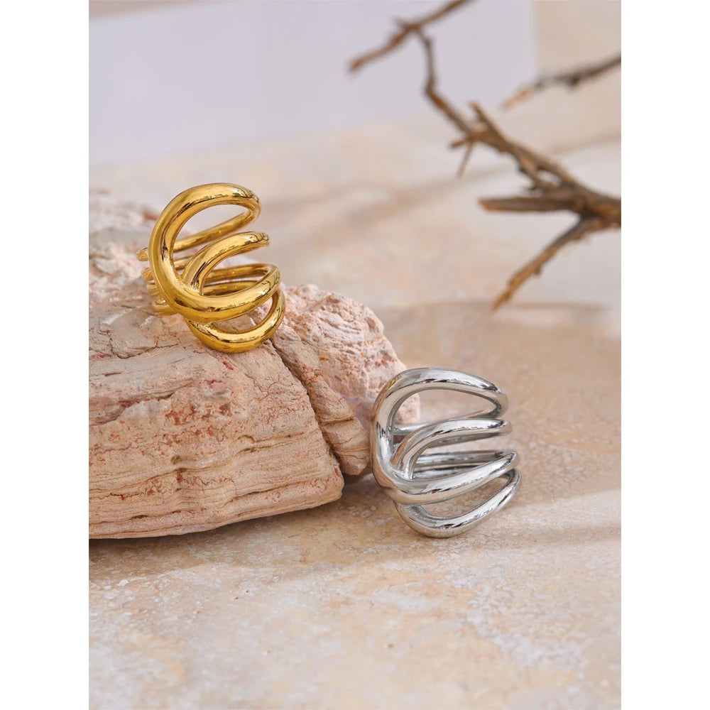 Geometric ring in gold-plated stainless steel.