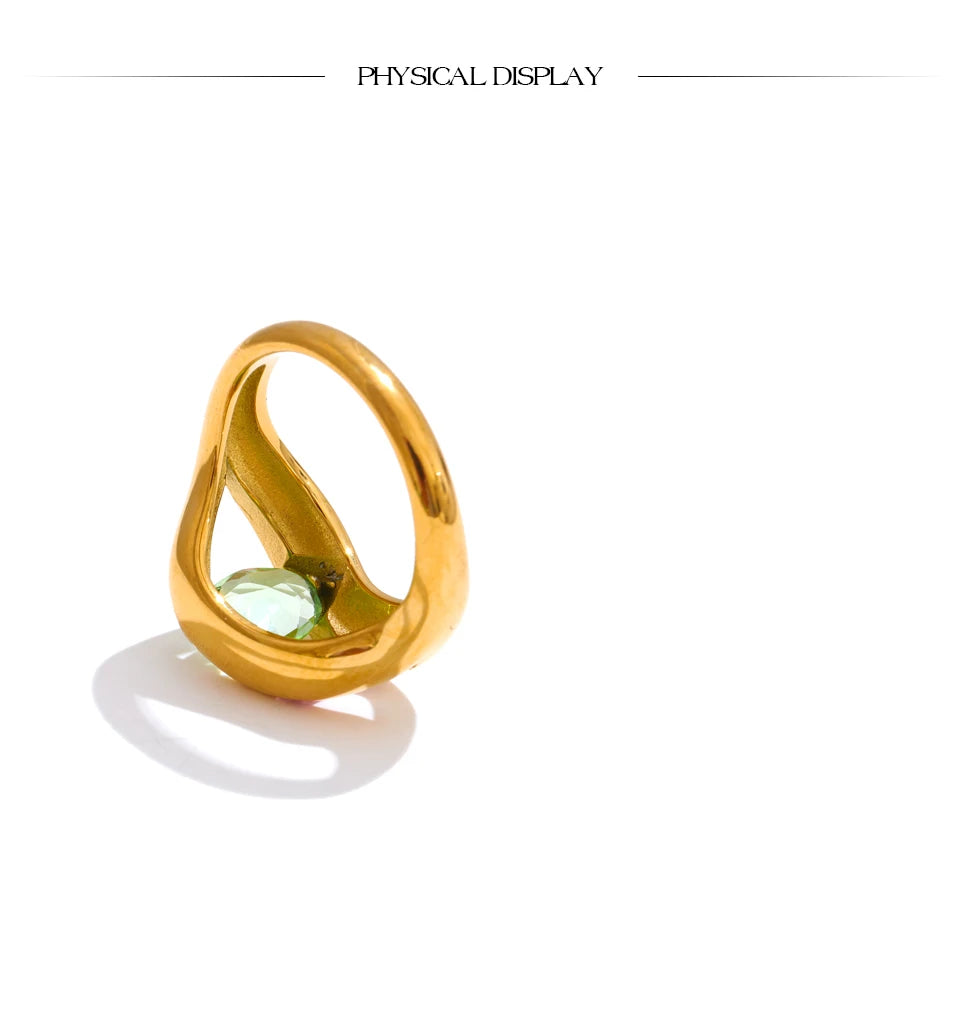 Cubic zirconia geometric ring in 18K gold-plated stainless steel with cubic zirconia.