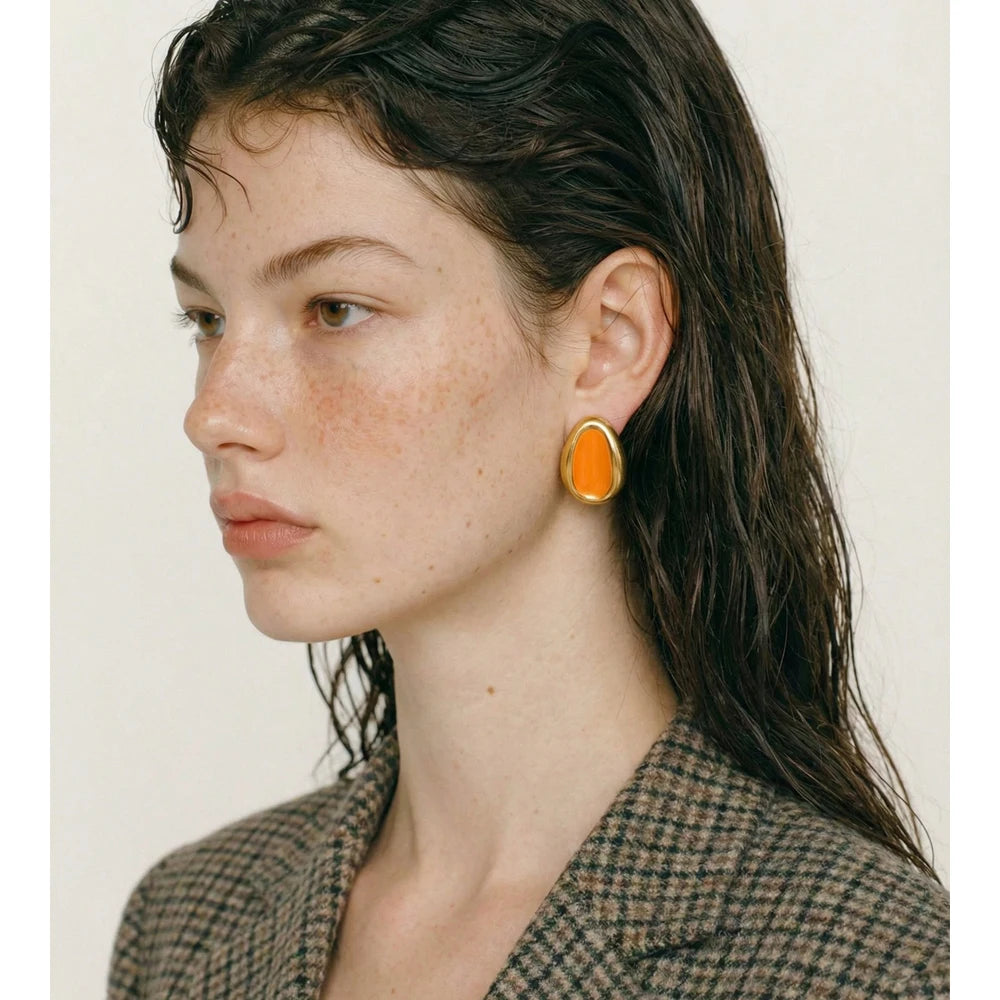 Enamel multi-color geometric earrings in gold-plated stainless steel with enamel.