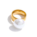 Pearl shell geometric ring in 18K gold-plated stainless steel with pearl and shell.