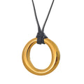 Gold-plated stainless steel necklace featuring a large circular pendant.