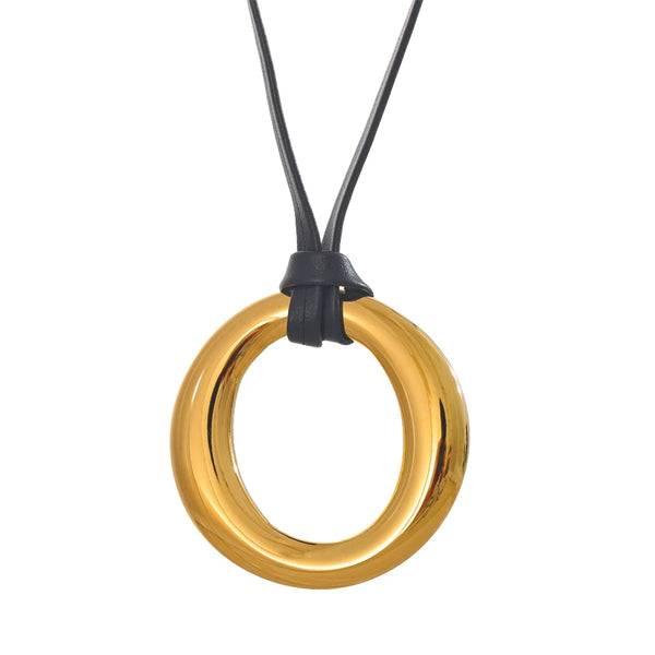 Gold-plated stainless steel necklace featuring a large circular pendant.