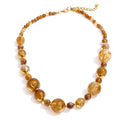 Pearl resin acrylic necklace in gold-plated stainless steel with pearl and resin.
